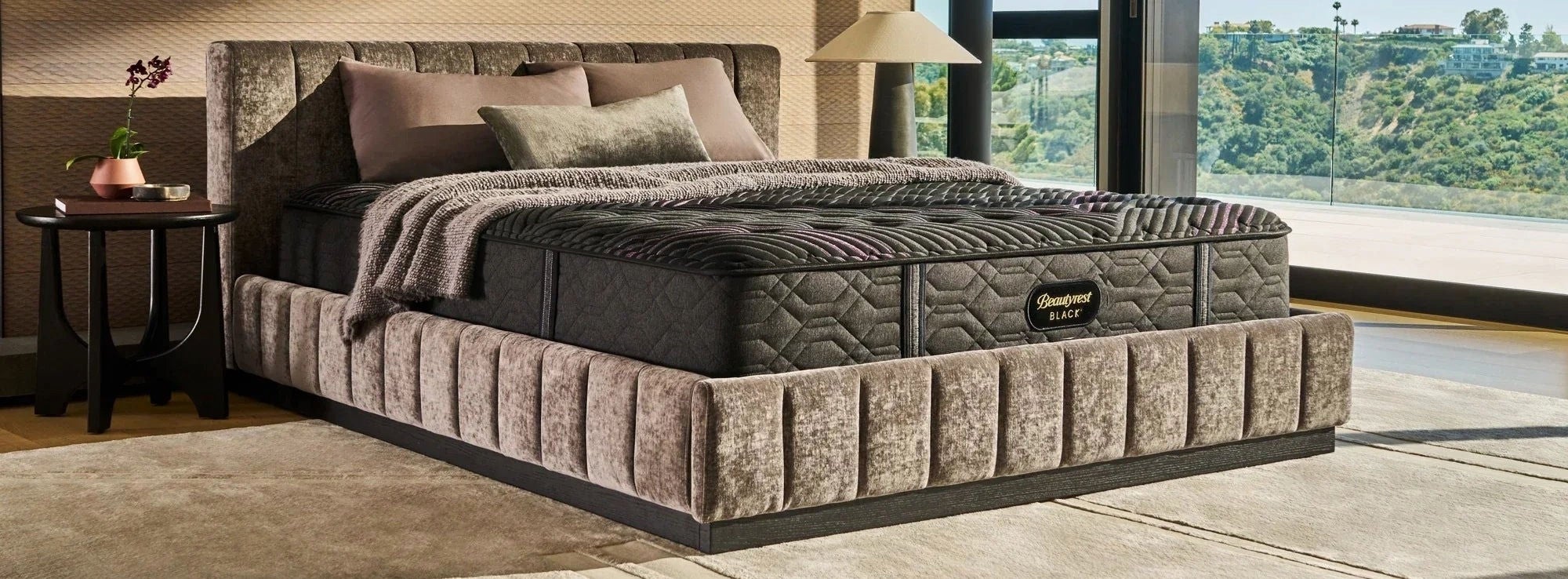 Luxury bed with scenic window view