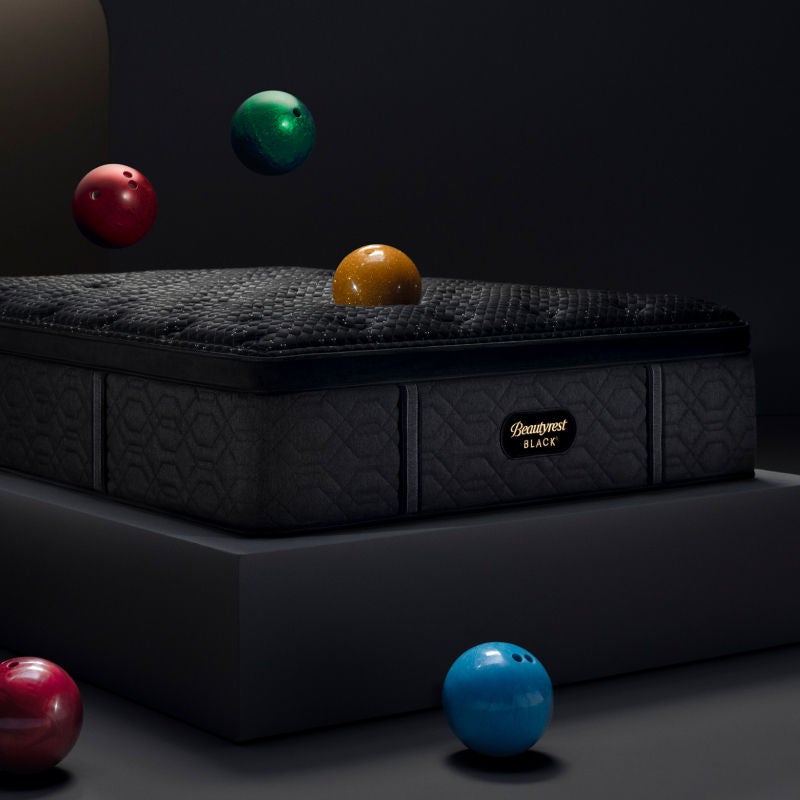 Luxury mattress with bowling balls test