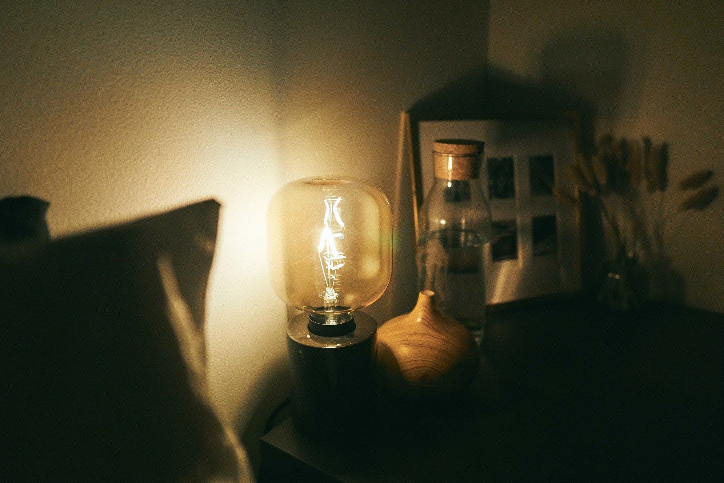 Warm bedside lamp with cozy decor