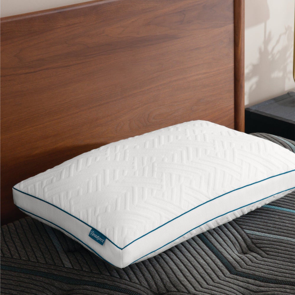 White memory foam pillow on bed