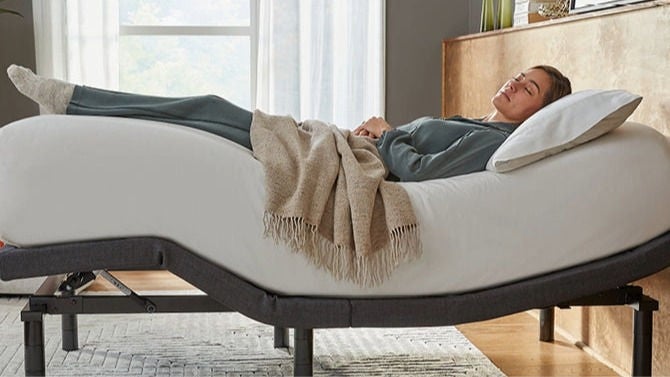 Adjustable bed in modern bedroom setting