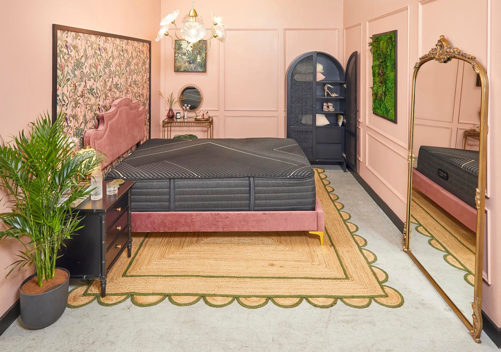 Elegant bedroom with pink decor and mirror