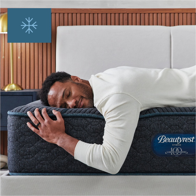 Man Relaxing on Beautyrest Hybrid Mattress
