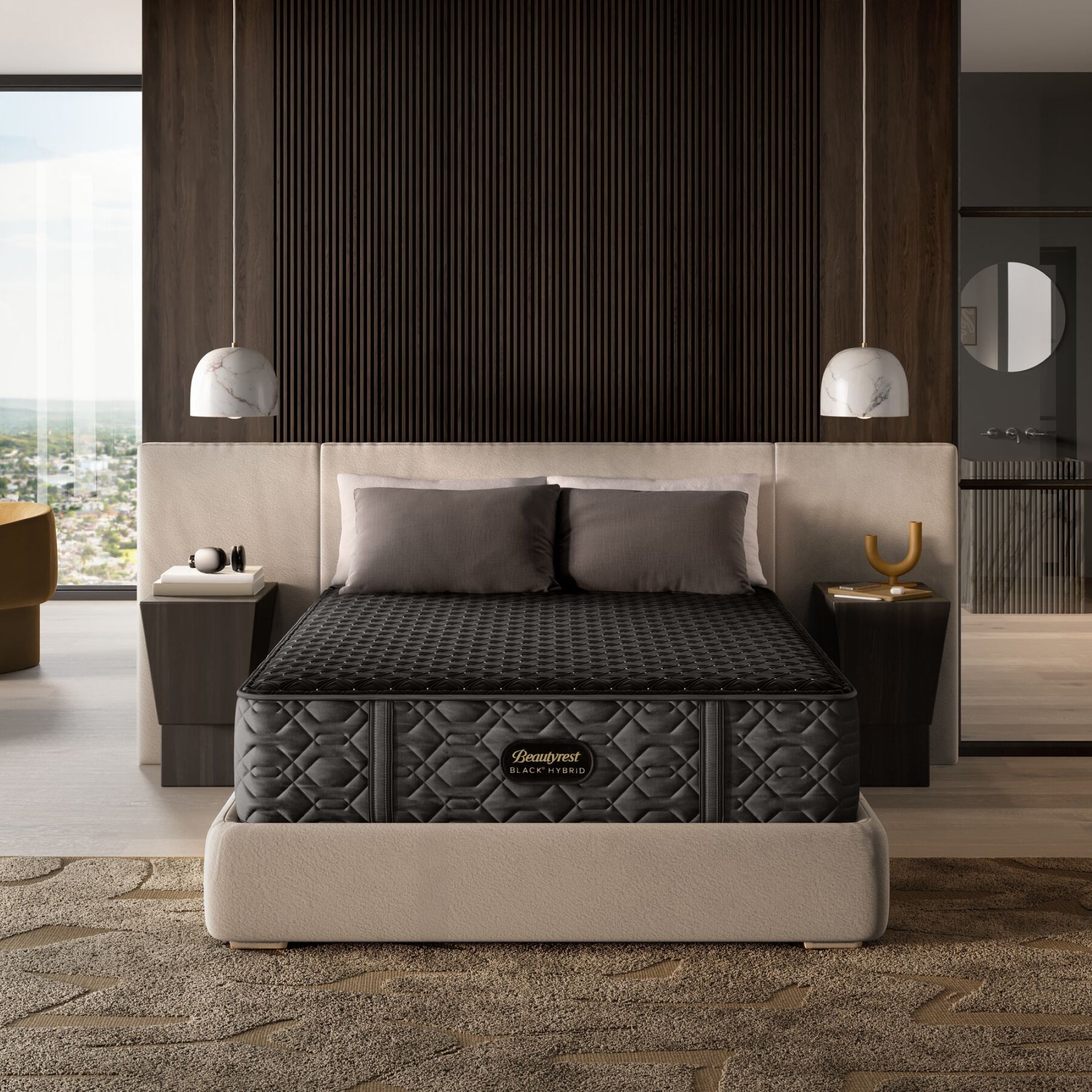 BeautyRest Firm Hybrid mattress sitting in a beige bed frame || series: Series Three || feel: Firm