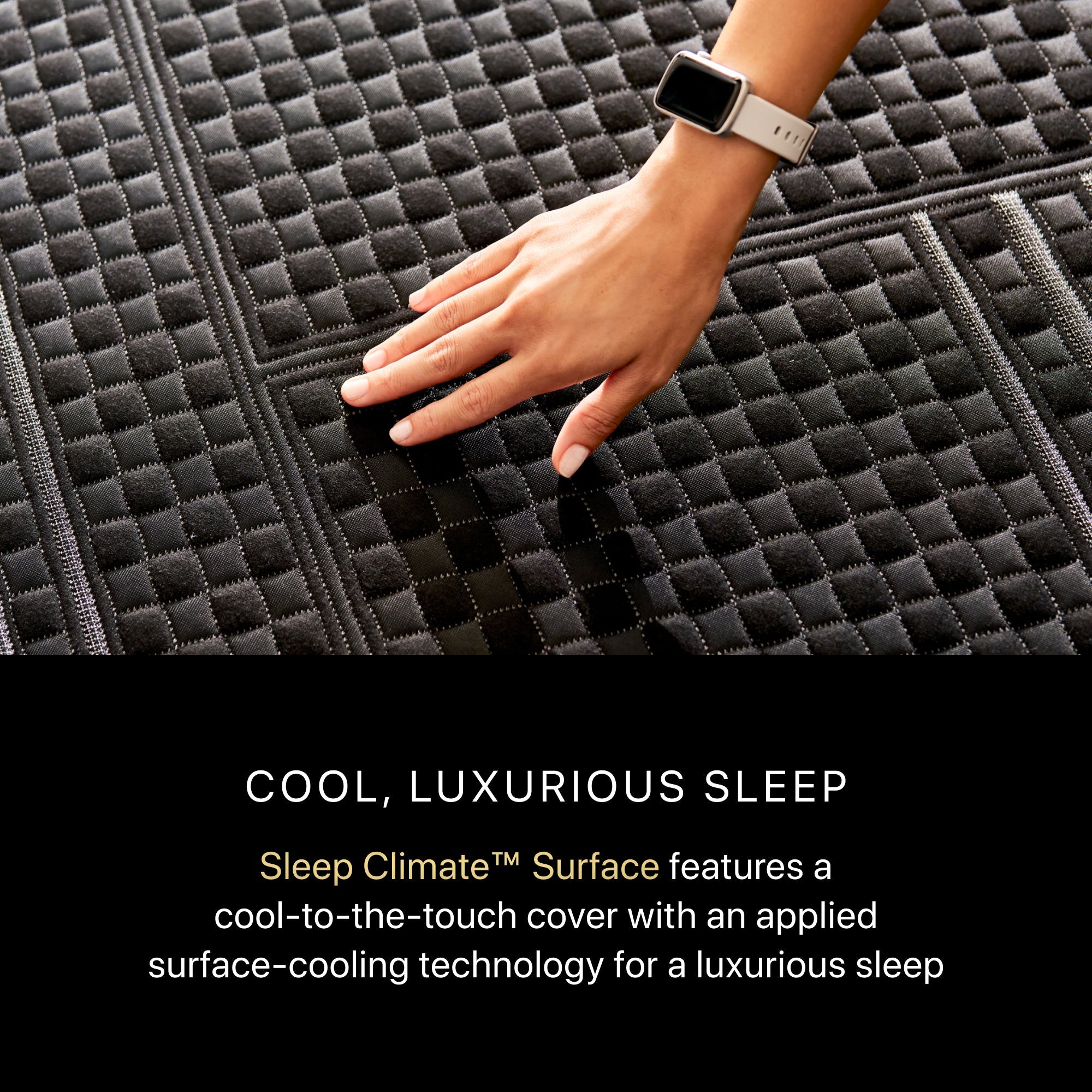 A hand rubbing on a BeautyRest Firm Hybrid mattress || series: Series One || feel: Firm