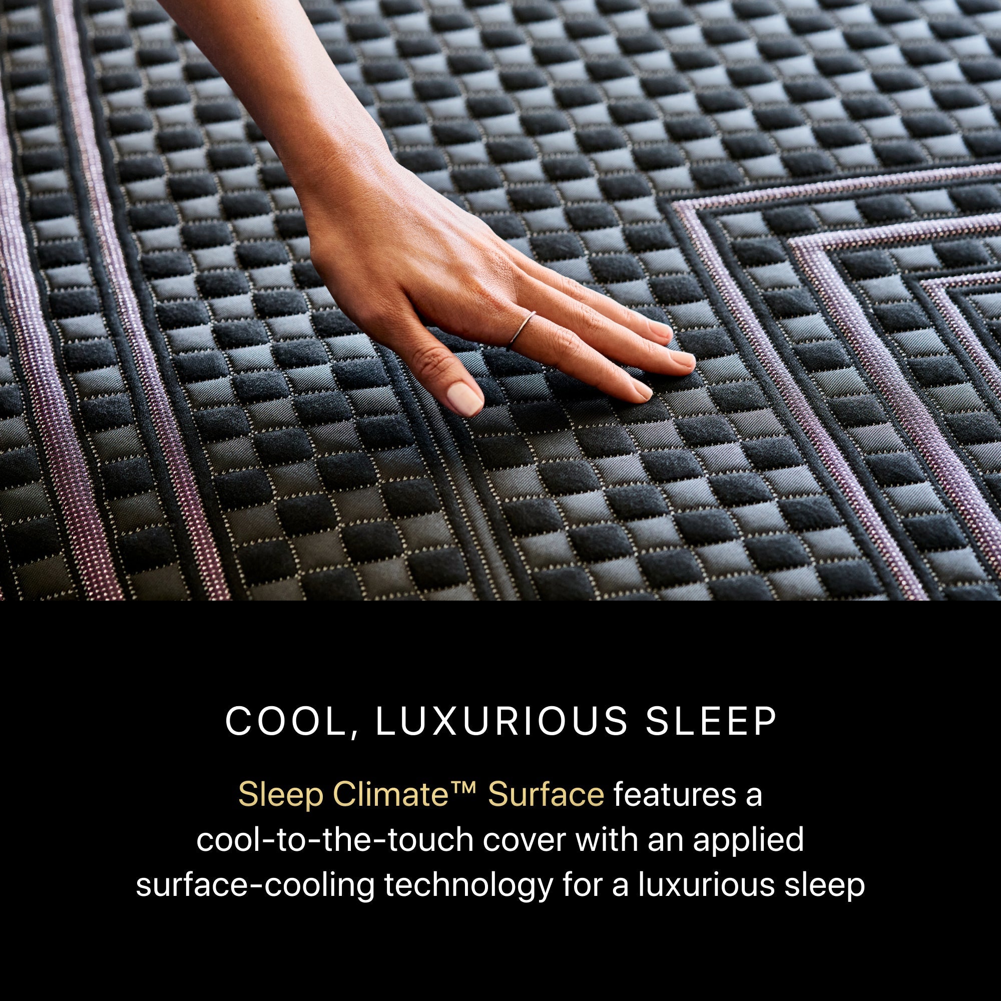 A hand rubbing on a BeautyRest Firm Hybrid mattress || series: Series Two || feel: Firm