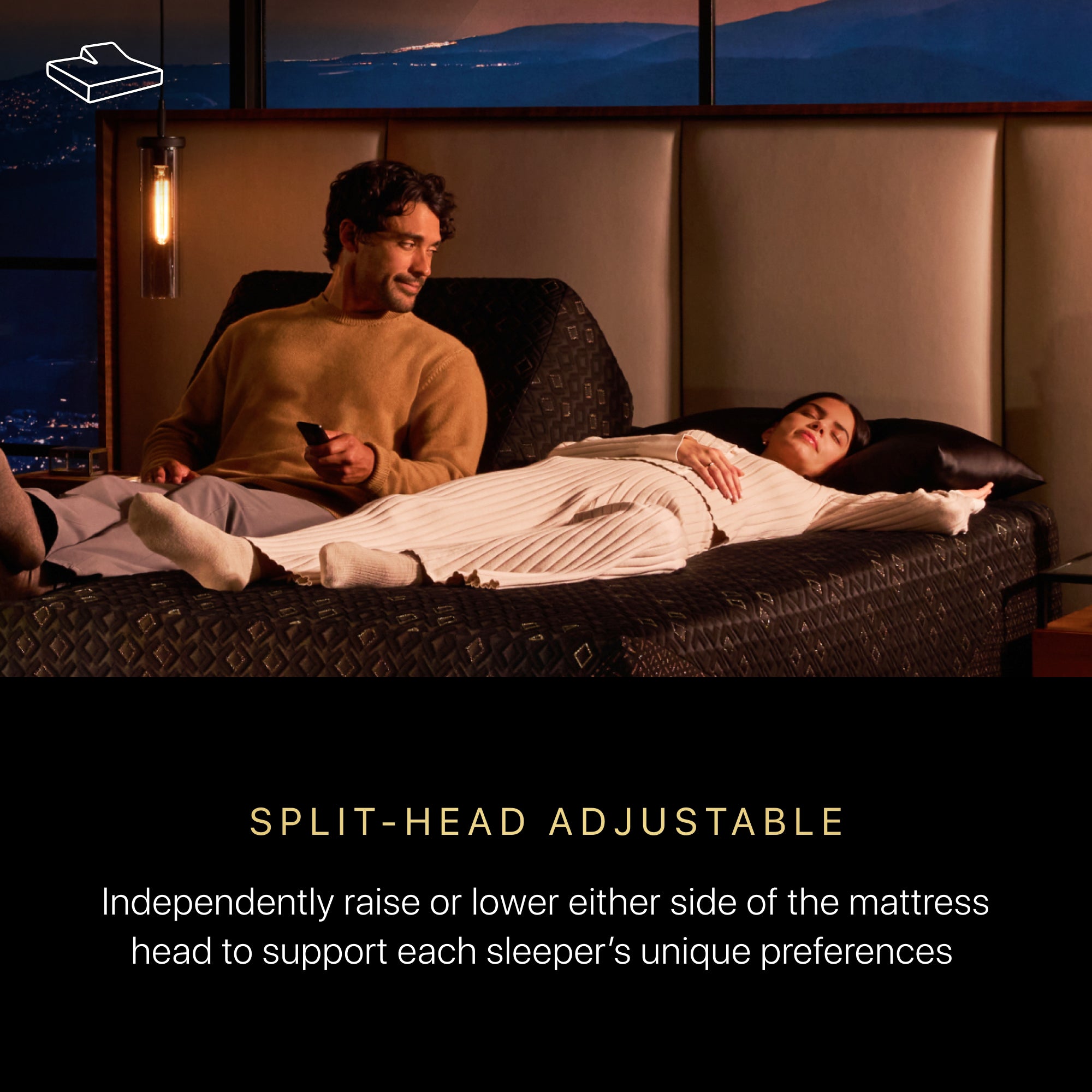 Image of a woman and man laying on a Beautyrest black luxury adjustable base. The caption under the image states Split-Head Adjustable. Independently raise or lower either side of the mattress head to support each sleeper's unique preferences.